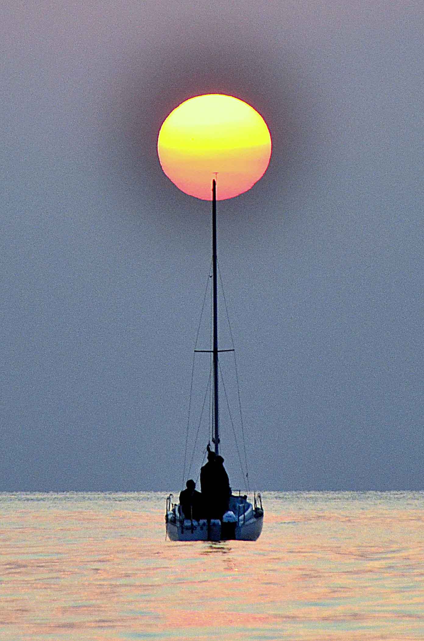 Sole e barca